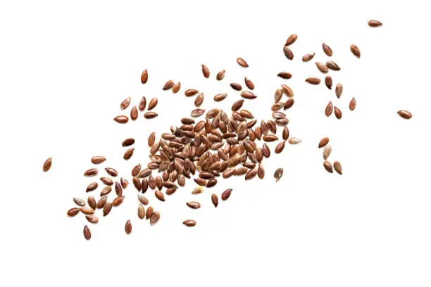 Flax seeds on white background