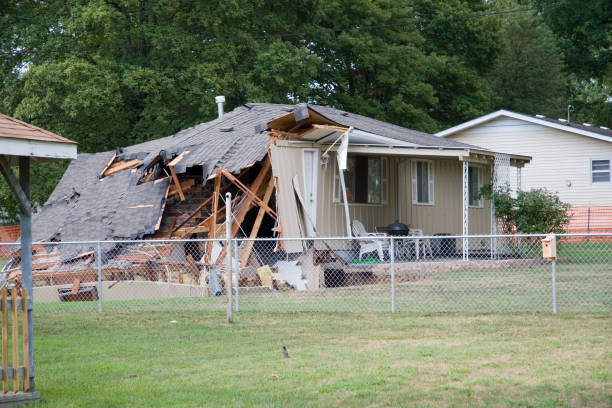 istock Back View of Home Falling into a Sink Hole 90612692