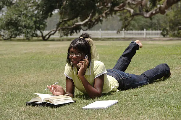 Photo of Dayo: Laying in the grass.