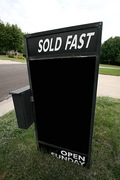 Sold fast real estate sign stock photo