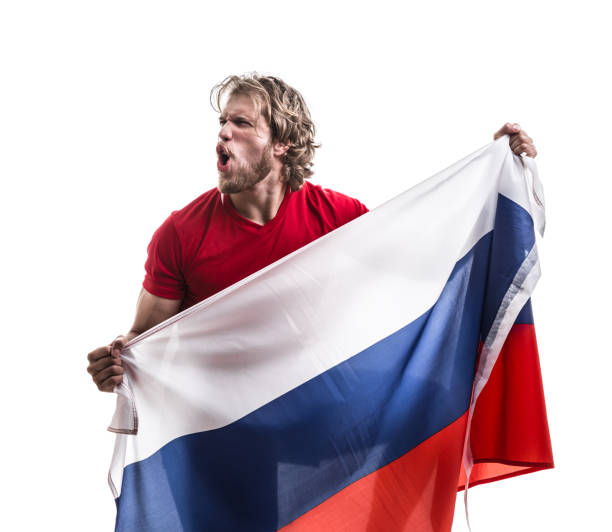 istock Russian male athlete / fan celebrating on white background 906142650
