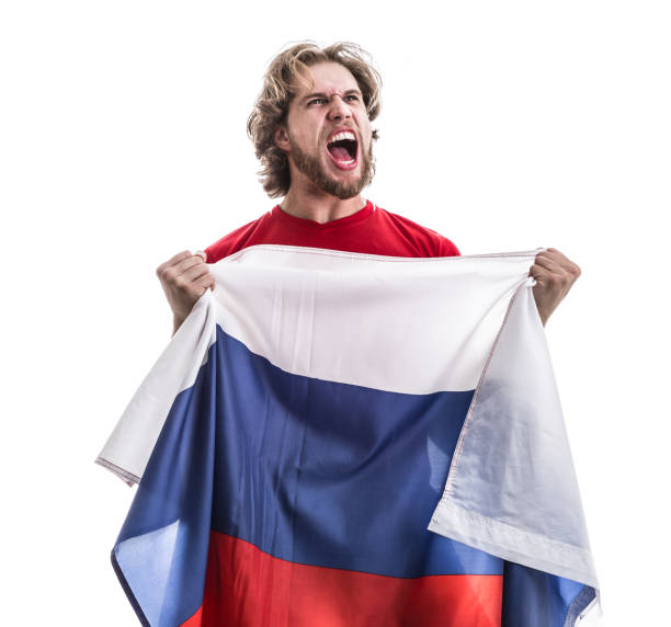istock Russian male athlete / fan celebrating on white background 906142678