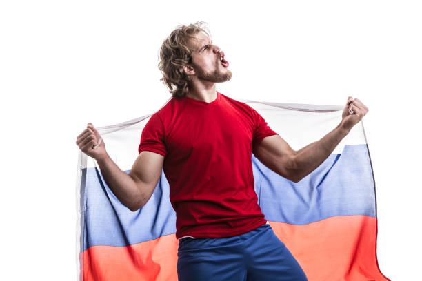 istock Russian male athlete / fan celebrating on white background 906142684