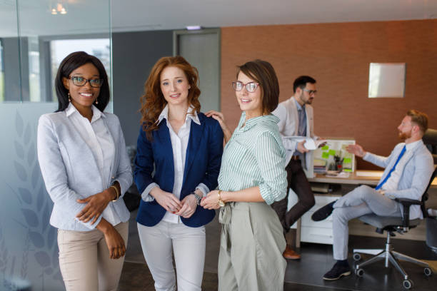 istock Portrait of female colleagues at work 906142734