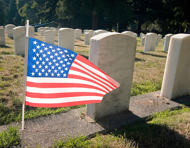 istock Waving American flag at military cemetery 90615081