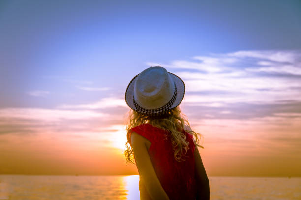 istock girl and sunset 906151200
