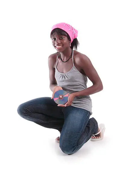 Photo of Dayo: Holding a CD.