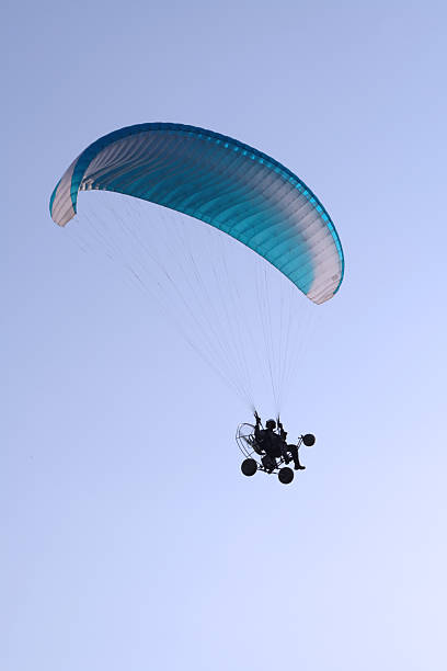 Flying paraglider in the sky 3 stock photo