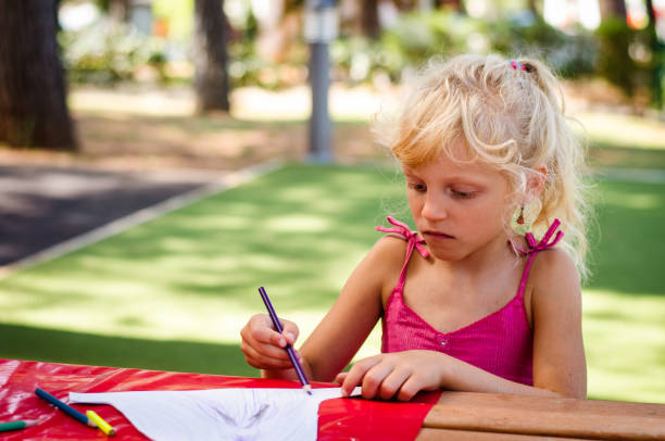 istock little blond girl 906156176
