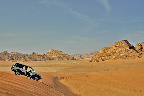 istock jeep car in desert 90616173