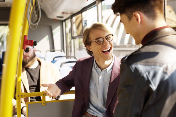 istock friends having conversation in public transport 906192832