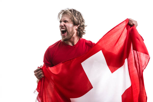 Swiss athlete / fan celebrating on white background sport collection swiss flag photos stock pictures, royalty-free photos & images