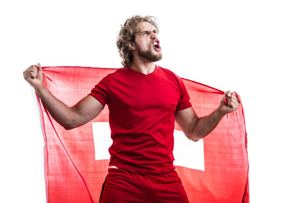 istock Swiss athlete / fan celebrating on white background 906193082