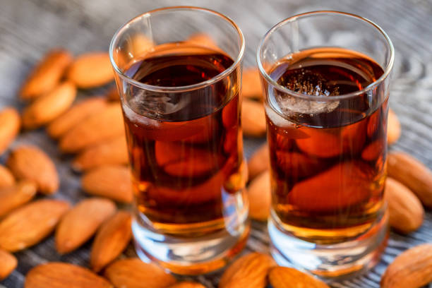 istock Italian amaretto liqueur with dry almonds 906193476