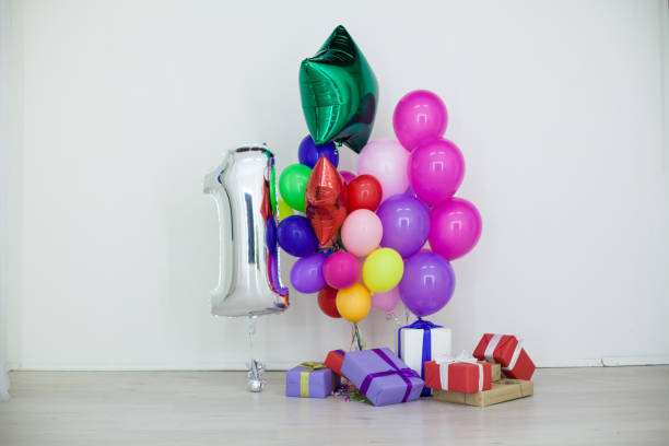 istock multi-colored balloons and gifts for the holiday 906222700