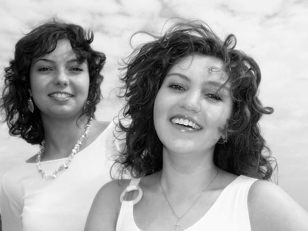 istock two happy smiling young girls 90623668