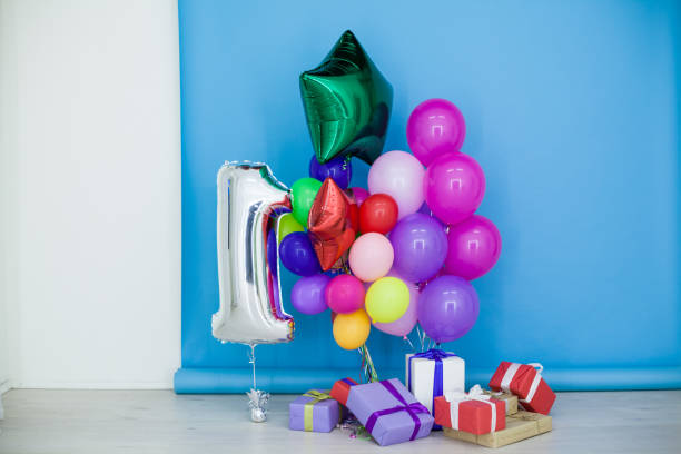 istock multi-colored balloons and gifts for the holiday 906238000