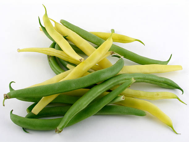 Pile of green and yellow string beans stock photo
