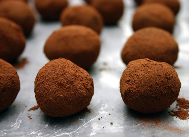Handmade Truffles (2)  chocolate truffle making stock pictures, royalty-free photos & images