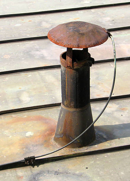 Rusty ventilation chimney stock photo