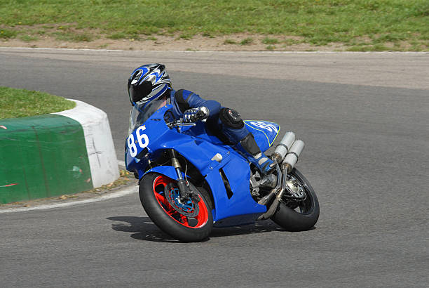 blu racer - motorcycle racing foto e immagini stock