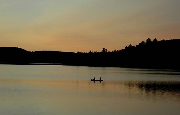 istock Sunset Canoe Fising 90631251