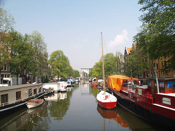 istock Boats in Amsterdams canal 90631888