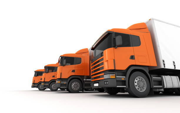 istock Logistics concept. Group of cargo trucks in row from right to left isolated on white background. Front perspective view. 3D illustration 906331268