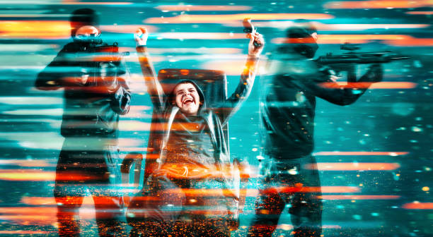 istock Boy plays immersive video game on computer and cheers as he wins 906339496
