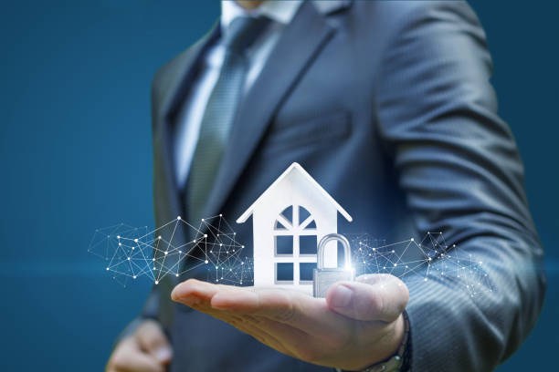istock Businessman with a house and castle. 906345728