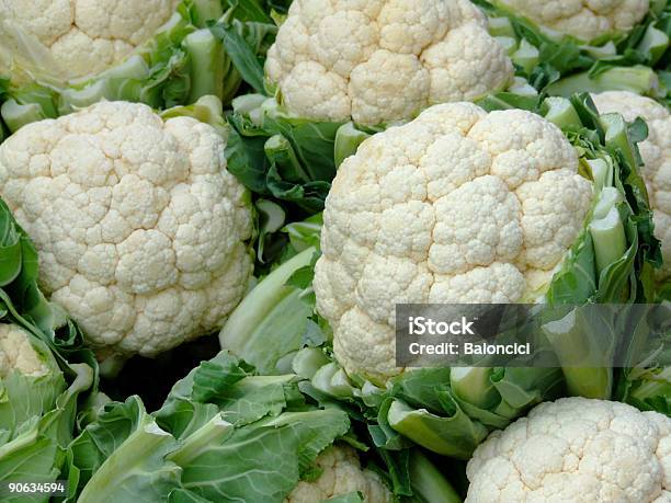 Closeup Of Several Heads Of Cauliflower Stock Photo - Download Image Now - Cauliflower, White Color, Market - Retail Space