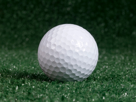 Golf Ball On Green Stock Photo - Download Image Now - Bush, Cap - Hat ...