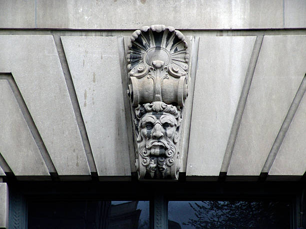 istock Carved Face  of man on building 90638475