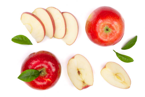 istock red apples with slices and leaves isolated on white background top view. Set or collection. Flat lay pattern 906387960