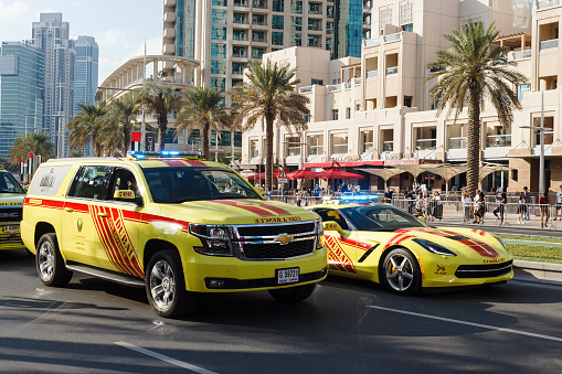Dubai, UAE - November 28, 2015: Fire and Rescue cars. Parade celebrate 44th anniversary National Day United Arab Emirates. Mohammed Bin Rashid Boulevard, Dubai Downtown.