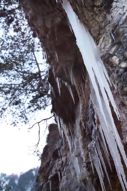 istock Close up of Icicles on Rock during Winter 906393620