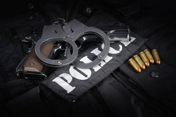 istock Police equipment on black background 906399132