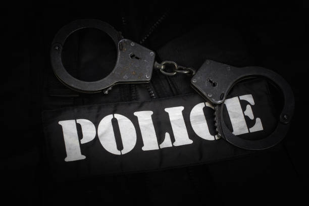istock Police equipment on black background 906402470