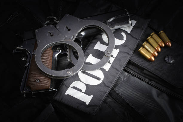 Police equipment on black background