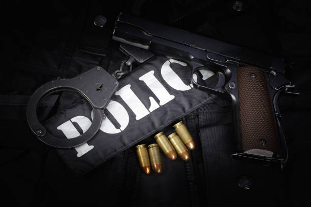 istock Police equipment on black background 906402904