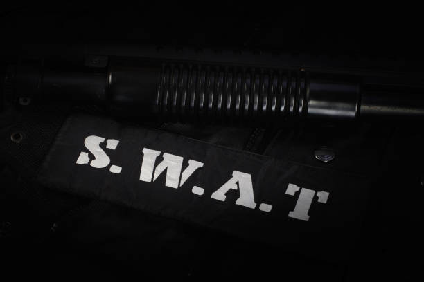Police equipment on black background