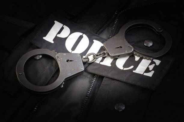 Police equipment on black background