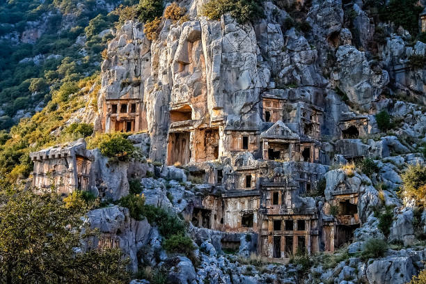 Lycian rock cut tombs in Myra in Turkey Archeological remains of the Lycian rock cut tombs in Myra, Turkey antalya province photos stock pictures, royalty-free photos & images