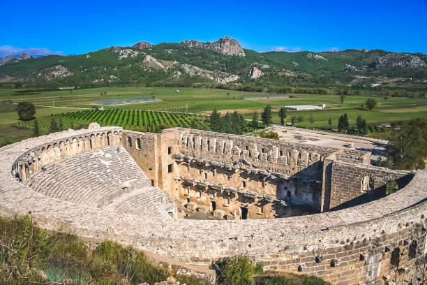Remnants of the open old circle theater, constructed by Greece architect Eenon during time of Mark Aurelius, Aspendos, Antalya, Turkey