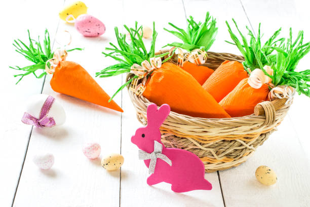 istock Handmade package for Easter sweet gift in form of carrots 906414390