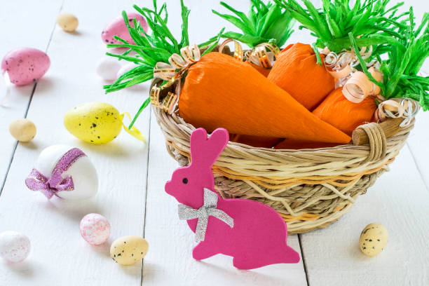istock Handmade package for Easter sweet gift in form of carrots 906414392