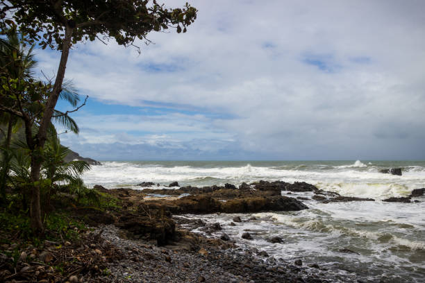 istock Rocky beach, rough sea 906462230