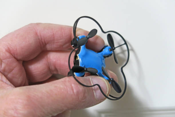 istock Small drone held in palm of a hand 906462410