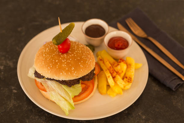 istock Hamburger with french fries 906464658