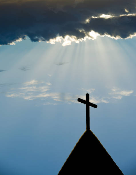 istock Church steeple silhouette, clouds, sunrise with copy space 906465272
